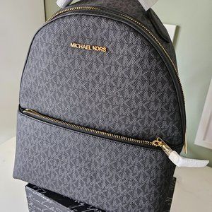Michael Kors brand Signature Sheila backpack (RARE gold hardware)